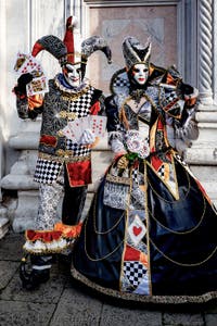 The parade of people in costume at the 2026 Venice Carnival in front of the Church of San Zaccaria.