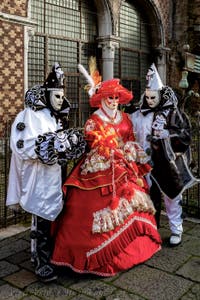 The parade of people in costume at the 2026 Venice Carnival in front of the Church of San Zaccaria.