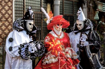 The parade of people in costume at the 2026 Venice Carnival in front of the Church of San Zaccaria.