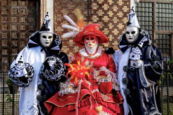 The parade of people in costume at the 2026 Venice Carnival in front of the Church of San Zaccaria.
