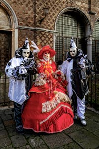 The parade of people in costume at the 2026 Venice Carnival in front of the Church of San Zaccaria.