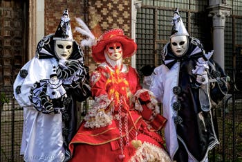 The parade of people in costume at the 2026 Venice Carnival in front of the Church of San Zaccaria.