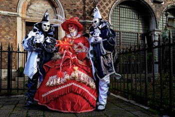 The parade of people in costume at the 2026 Venice Carnival in front of the Church of San Zaccaria.