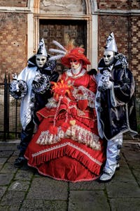 The parade of people in costume at the 2026 Venice Carnival in front of the Church of San Zaccaria.