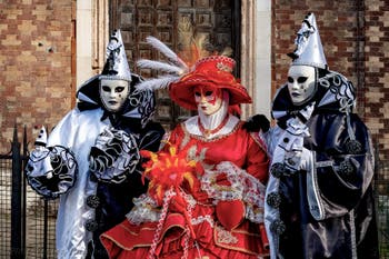 The parade of people in costume at the 2026 Venice Carnival in front of the Church of San Zaccaria.