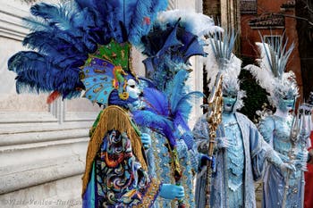 The parade of people in costume at the 2026 Venice Carnival in front of the Church of San Zaccaria.