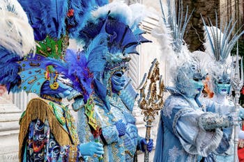 The parade of people in costume at the 2026 Venice Carnival in front of the Church of San Zaccaria.