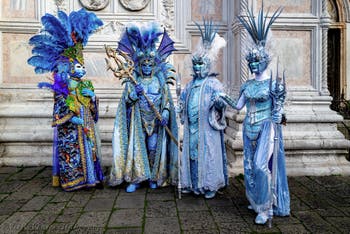The parade of people in costume at the 2026 Venice Carnival in front of the Church of San Zaccaria.
