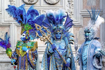 Venice carnival costumed figures