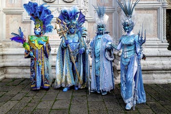 The parade of people in costume at the 2026 Venice Carnival in front of the Church of San Zaccaria.