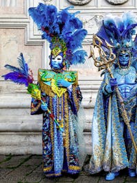 The parade of people in costume at the 2026 Venice Carnival in front of the Church of San Zaccaria.