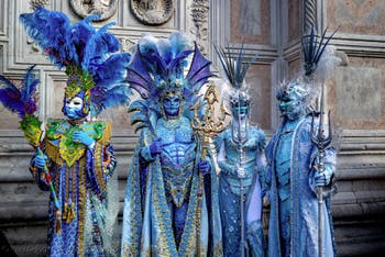 The parade of people in costume at the 2026 Venice Carnival in front of the Church of San Zaccaria.