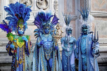 The parade of people in costume at the 2026 Venice Carnival in front of the Church of San Zaccaria.