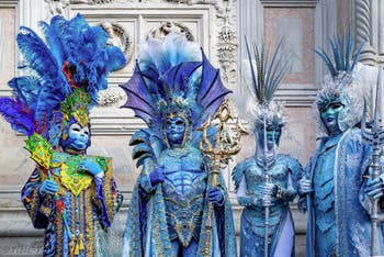 The parade of people in costume at the 2026 Venice Carnival in front of the Church of San Zaccaria.