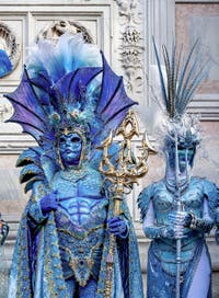 The parade of people in costume at the 2026 Venice Carnival in front of the Church of San Zaccaria.