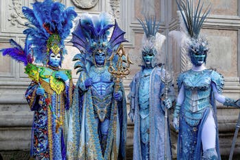 The parade of people in costume at the 2026 Venice Carnival in front of the Church of San Zaccaria.