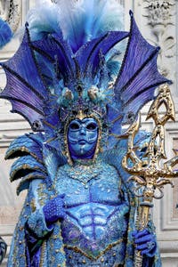 The parade of people in costume at the 2026 Venice Carnival in front of the Church of San Zaccaria.