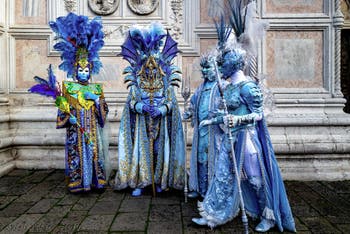 The parade of people in costume at the 2026 Venice Carnival in front of the Church of San Zaccaria.