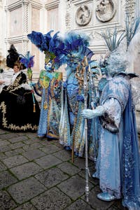 The parade of people in costume at the 2026 Venice Carnival in front of the Church of San Zaccaria.
