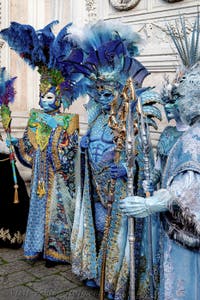 The parade of people in costume at the 2026 Venice Carnival in front of the Church of San Zaccaria.