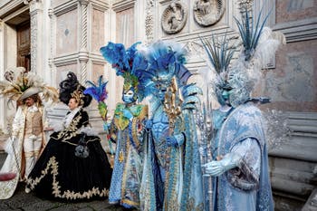The parade of people in costume at the 2026 Venice Carnival in front of the Church of San Zaccaria.