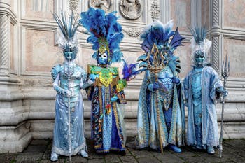 The parade of people in costume at the 2026 Venice Carnival in front of the Church of San Zaccaria.