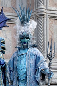 The parade of people in costume at the 2026 Venice Carnival in front of the Church of San Zaccaria.