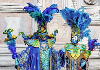 The parade of people in costume at the 2026 Venice Carnival in front of the Church of San Zaccaria.