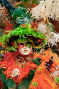 The parade of people in costume at the 2026 Venice Carnival in front of the Church of San Zaccaria.