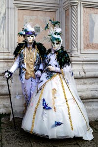 The parade of people in costume at the 2026 Venice Carnival in front of the Church of San Zaccaria.