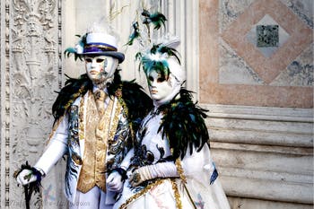 The parade of people in costume at the 2026 Venice Carnival in front of the Church of San Zaccaria.
