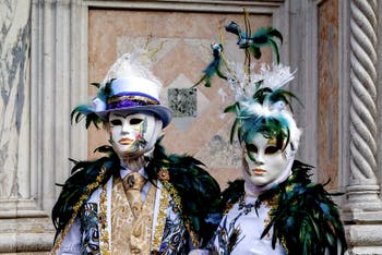 The parade of people in costume at the 2026 Venice Carnival in front of the Church of San Zaccaria.