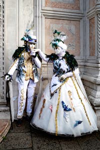 The parade of people in costume at the 2026 Venice Carnival in front of the Church of San Zaccaria.