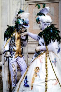 The parade of people in costume at the 2026 Venice Carnival in front of the Church of San Zaccaria.