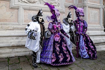 The parade of people in costume at the 2026 Venice Carnival in front of the Church of San Zaccaria.