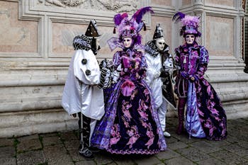 The parade of people in costume at the 2026 Venice Carnival in front of the Church of San Zaccaria.
