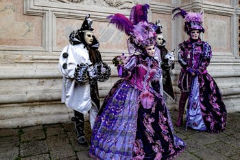 The parade of people in costume at the 2026 Venice Carnival in front of the Church of San Zaccaria.