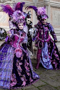 The parade of people in costume at the 2026 Venice Carnival in front of the Church of San Zaccaria.