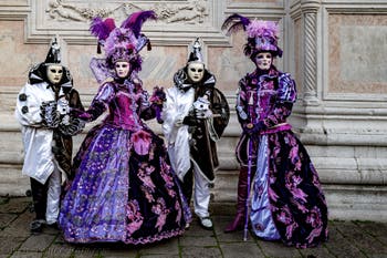 The parade of people in costume at the 2026 Venice Carnival in front of the Church of San Zaccaria.