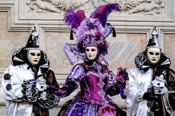 The parade of people in costume at the 2026 Venice Carnival in front of the Church of San Zaccaria.
