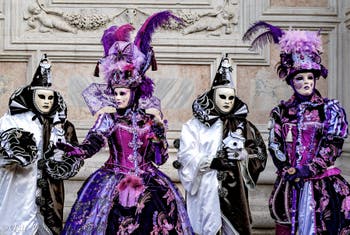 The parade of people in costume at the 2026 Venice Carnival in front of the Church of San Zaccaria.