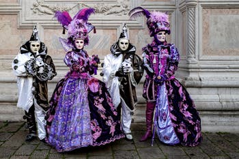 The parade of people in costume at the 2026 Venice Carnival in front of the Church of San Zaccaria.