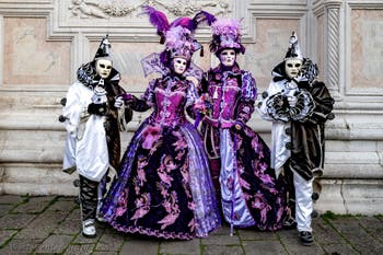 The parade of people in costume at the 2026 Venice Carnival in front of the Church of San Zaccaria.