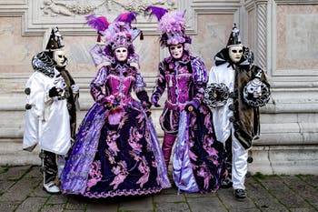 The parade of people in costume at the 2026 Venice Carnival in front of the Church of San Zaccaria.
