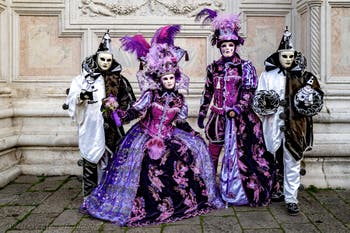 The parade of people in costume at the 2026 Venice Carnival in front of the Church of San Zaccaria.