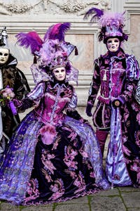 The parade of people in costume at the 2026 Venice Carnival in front of the Church of San Zaccaria.