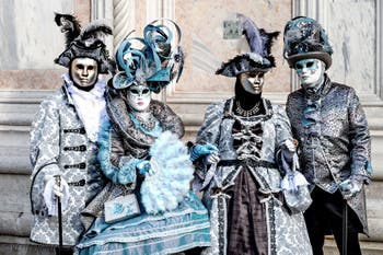 The parade of people in costume at the 2026 Venice Carnival in front of the Church of San Zaccaria.