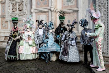 The parade of people in costume at the 2026 Venice Carnival in front of the Church of San Zaccaria.