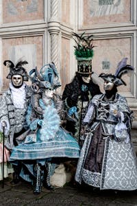 The parade of people in costume at the 2026 Venice Carnival in front of the Church of San Zaccaria.