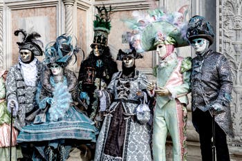 Venice carnival costumed figures